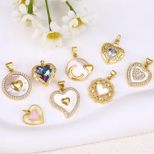Set of eight gold-plated heart and round shell pendants with sparkling zircon accents