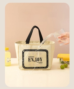 Waterproof cream lunch tote showing durable oxford fabric with water-repellent surface