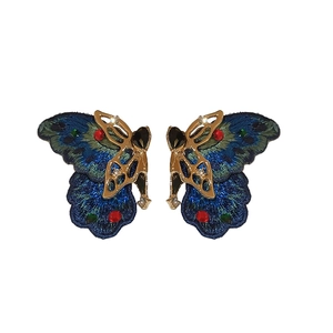 Vintage gold butterfly earrings with blue and green embroidery and inlaid gemstones