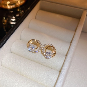 Elegant gold double circle geometric stud earrings with sparkling cubic zirconia pavé