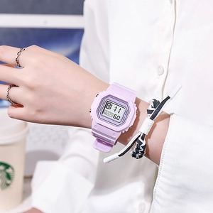 Purple square LED sports watch with waterproof silicone strap on a person's wrist