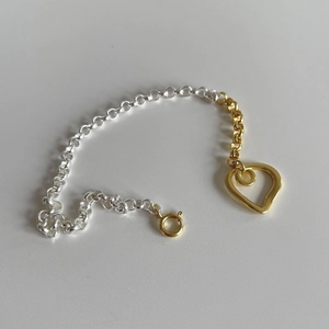 Elegant S925 sterling silver heart bracelet with two-tone gold and silver link chain