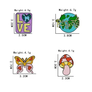 Detailed size chart for eco-friendly enamel pins showing dimensions and weights of each design