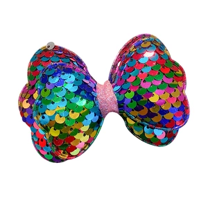 Rainbow sequin bow hair clip for girls featuring colorful fish-scale pattern and glitter center