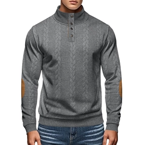 Close-up of grey jacquard knit henley sweater featuring elbow patches and buttoned neck