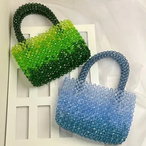 Exquisite handmade beaded acrylic handbag featuring green and blue gradient designs