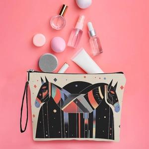 Portable cosmetic bag with geometric horse print and black zipper on pink background
