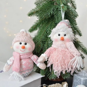 Pink and white plush snowman Christmas tree hanging ornaments with knit sweaters and sequins