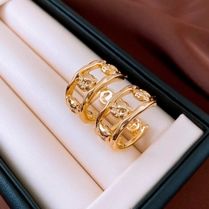 Golden irregular panther head stud earrings with vintage hollow C-shape metal design