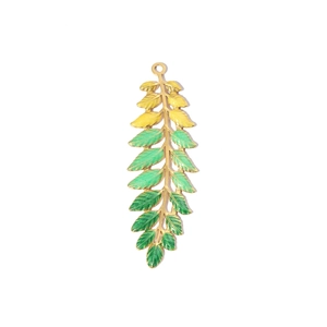 Detailed close-up of golden leaf pendant with yellow to green enamel gradient effect