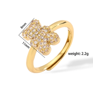 Detailed view of gold flower ring with crystal pavé setting including size measurements