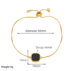 Close-up of 18k gold plated adjustable box chain bracelet with square black druzy stone