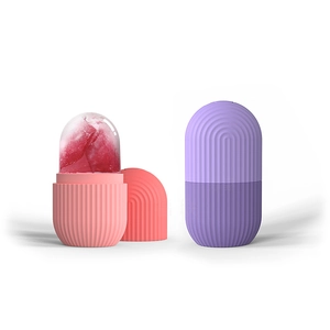 Pink and purple silicone ice rollers for facial massage showing interior frozen gel texture