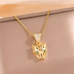 Hollow leopard head necklace with green zircon eyes and clear crystals on a box chain