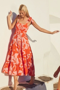 Detail of pink floral maxi dress with smocked bodice and self-tie bow shoulder straps