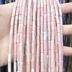 Macro detail of natural pink crystal cylindrical beads for DIY necklace and bracelet making