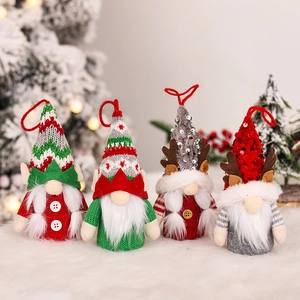 Set of four knitted Christmas gnome ornaments with sequins and antlers for tree hanging