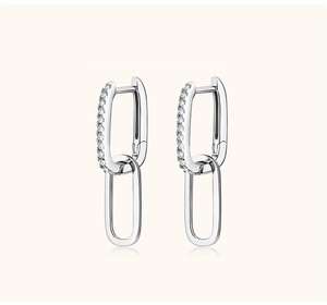 Detailed macro view of S925 silver double loop earrings with sparkling zircon inlay