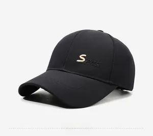 Detailed embroidery of a gold letter S and Sports text on a black baseball cap