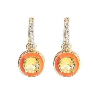 Detail view of gold hoop earrings with orange enamel and yellow round-cut crystals