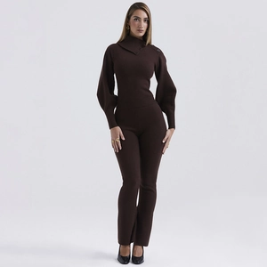Full view of women's dark brown two-piece knit set with long sleeve top and flared pants