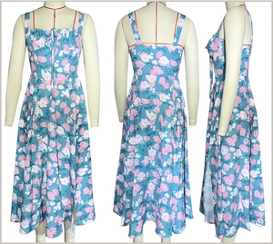 Detailed view of light blue floral strap dress featuring side slit and drawstring chest