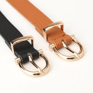 Minimalist PU leather belts for women with polished gold buckles in black and tan