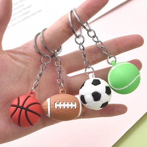 Variety of sports ball keychains including basketball and football on a colorful background