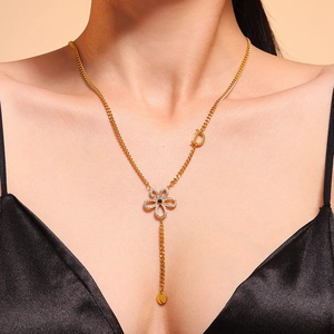 18k gold plated stainless steel floral necklace with zircon accents and a Y-chain design