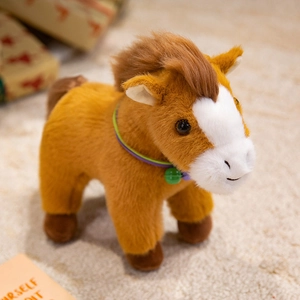 Brown plush pony doll featuring a green bell collar on a soft cream carpet background