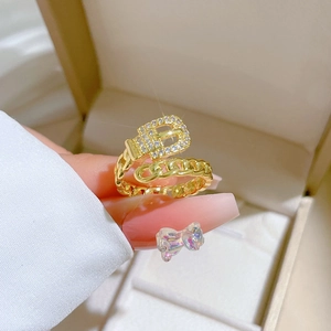 Adjustable gold plated belt buckle ring with sparkling cubic zirconia and Cuban link chain