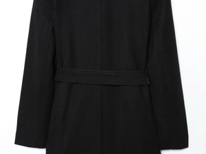 Detail of wool blend coat showing rear belt structure and premium woven fabric texture