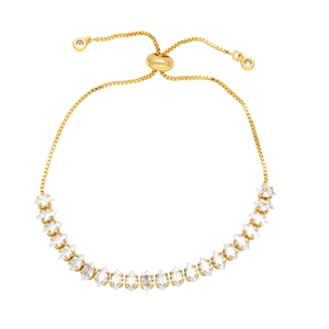 Detail of adjustable gold bracelet featuring marquise-cut zircons and box chain closure