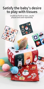 Macro detail of plush baby tissue box toy with sensory mesh and colorful alphabet cloths