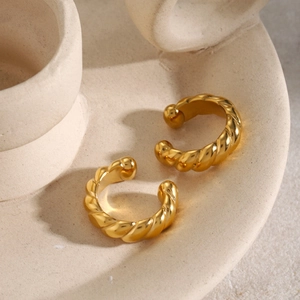 Boucles d'oreilles clips en acier inoxydable doré torsadé sur plateau céramique