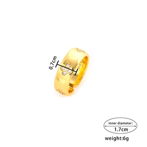 Polished golden four-leaf clover ring with sparkling diamond accents for a stylish look