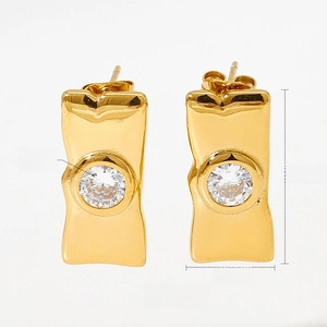 Detail view of 19.4mm gold rectangular stud earrings featuring a central zircon stone