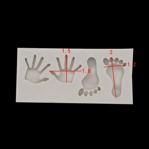 Silicone mold with baby hand and footprints, showing precise dimensions in centimeters