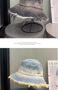 Close-up of distressed fringe edges on gradient denim bucket hats in gray and blue