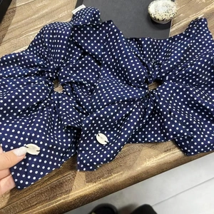 Polka dot fabric hair scrunchies in navy blue with shell charm and Happiness tag