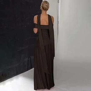 Back view of a sleek off-shoulder black maxi dress featuring elegant ribbon tie details