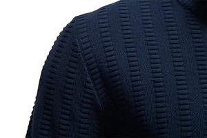 Close-up of navy blue men's knitted sweater showing detailed 3D stripe texture and fabric