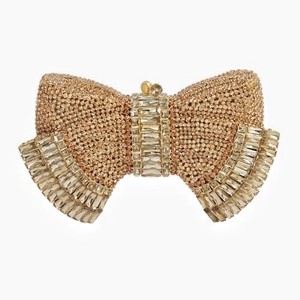 Elegant gold bow-shaped evening clutch bag encrusted with sparkling rhinestones for parties