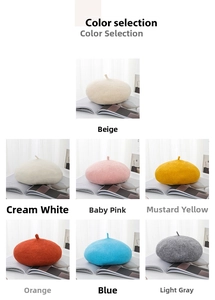 Detail view of wool beret color options in beige, pink, blue, yellow and grey