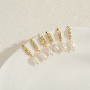 Elegant 14K gold plated freshwater pearl earrings with zircon inlay and oval drop designs