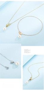 Detail of elegant water drop pearl tassel necklace and bracelet set in gold finish