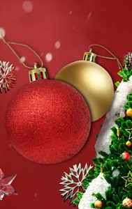 Close-up of glitter red and matte gold Christmas balls with festive snow background