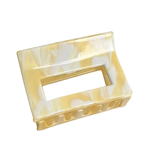 Elegant square acetate hair claw clip featuring a yellow and white marble pattern design