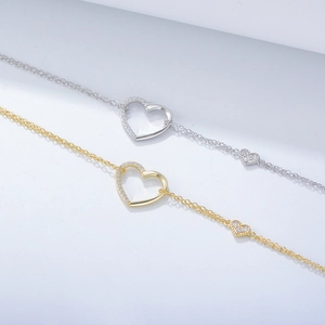 Double-layered S925 silver heart bracelet with glittering zircon stones in gold and silver