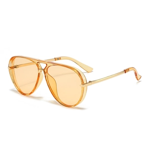 Retro aviator sunglasses with orange translucent lenses and gold metal frame for fashion